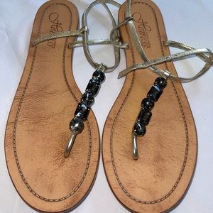Heiress bejeweled gold leather sandals. Never worn.